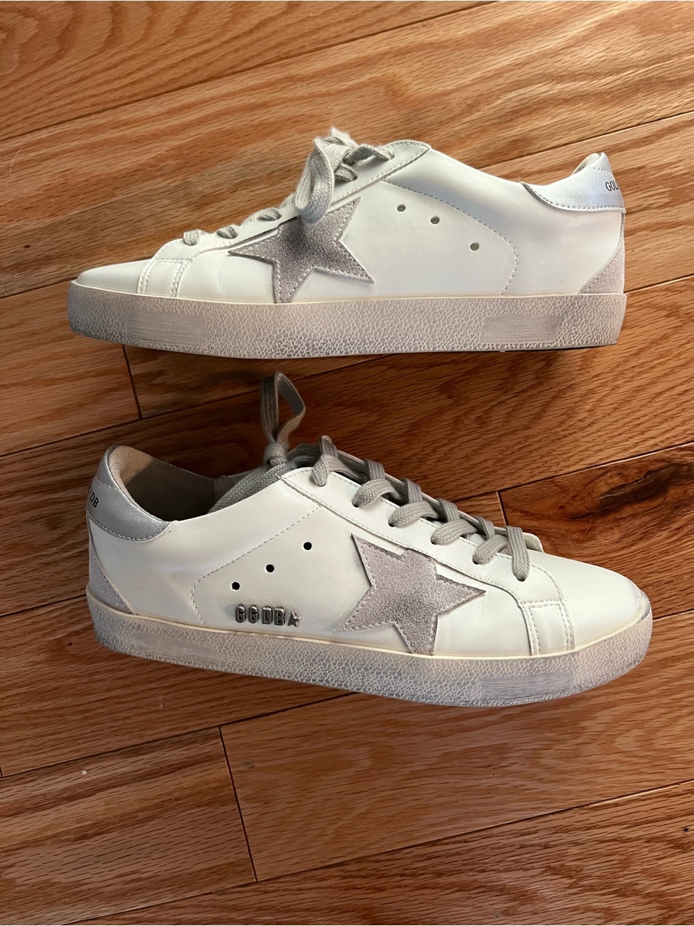White Sneakers with Silver Star Accent